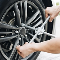 Repairing a wheel puncture with a harness