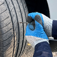 Repairing a wheel puncture with a harness